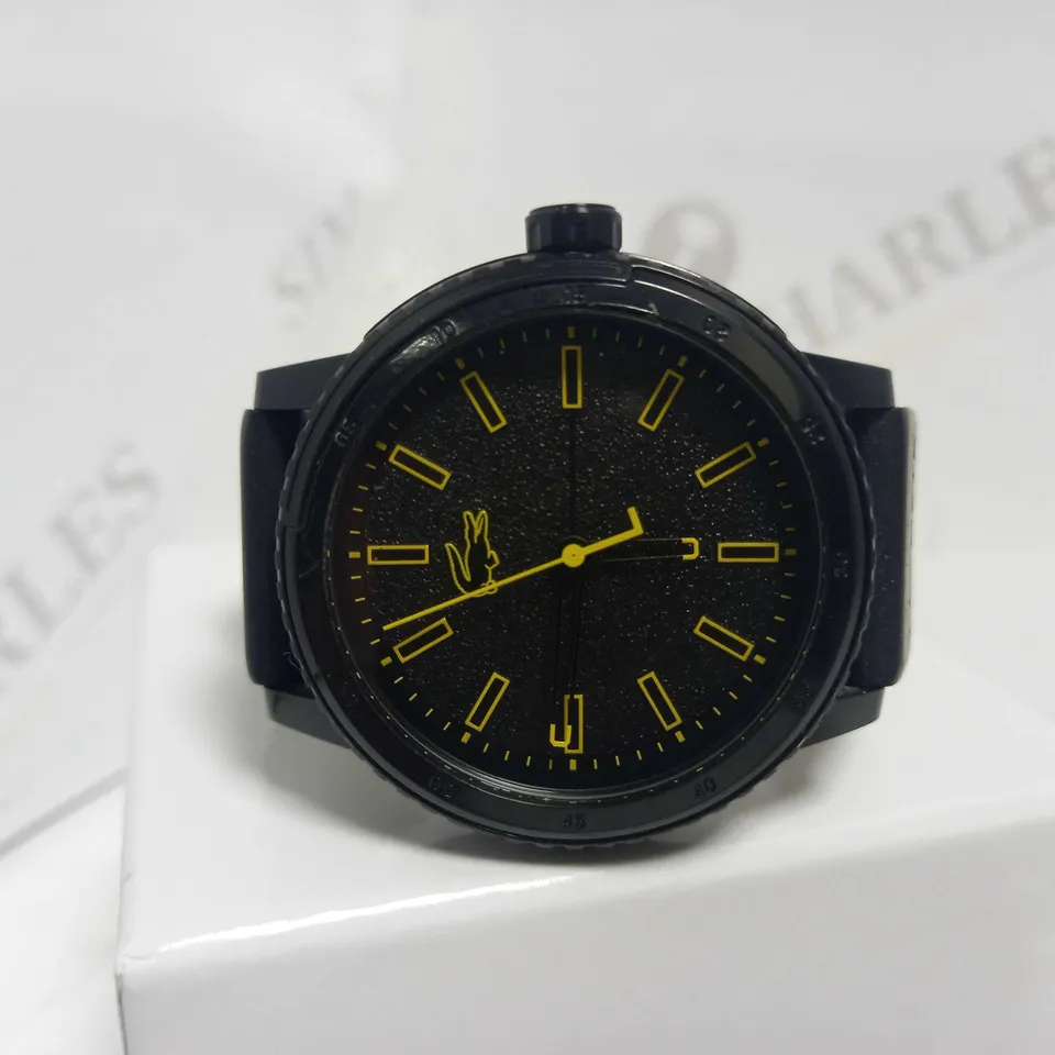 LACOSTE BLACK DIAL YELLOW ACCENT RUBBER STRAP WATCH  RRP £119
