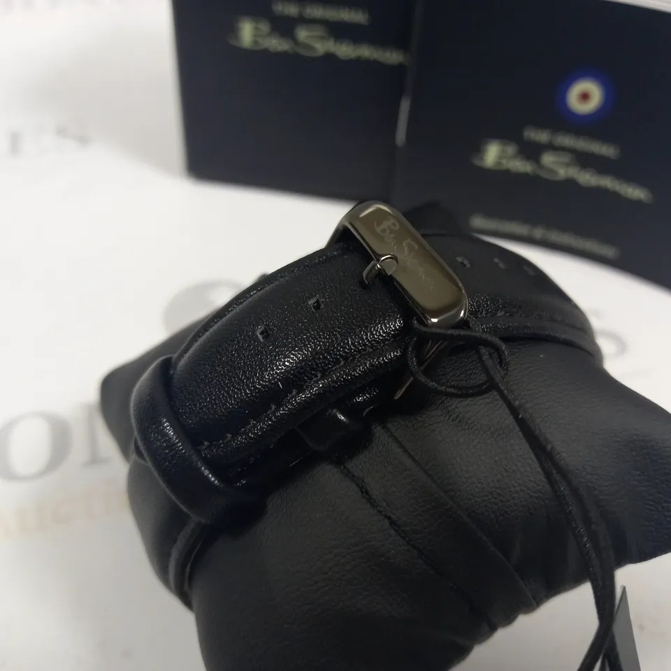 BOXED BEN SHERMAN STAINLESS STEEL BACK WATCH WITH BLACK LEATHER STRAP