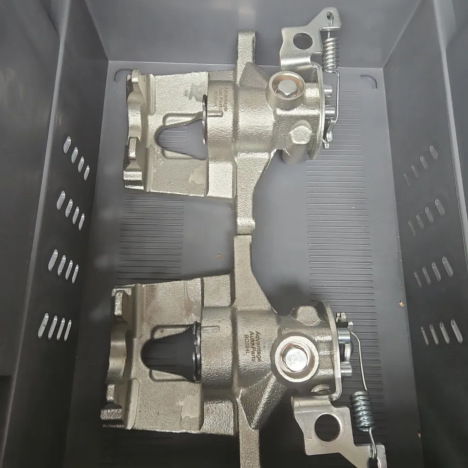 AUTOMOTIVE BRAKE CALIPER HOUSING PAIR – CAST METAL COMPONENTS (VERIFY PART)