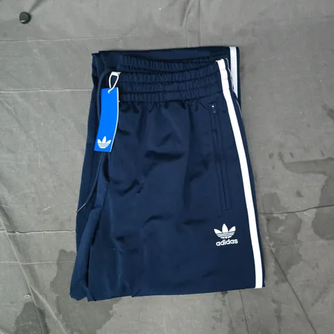 ADIDAS FIREBIRD TRACK PANTS IN NAVY/WHITE SIZE MEDIUM
