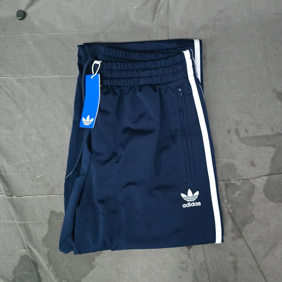 ADIDAS FIREBIRD TRACK PANTS IN NAVY/WHITE SIZE MEDIUM
