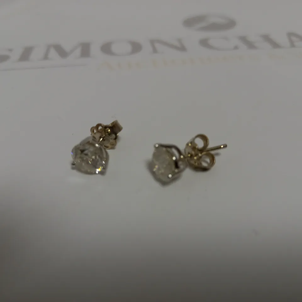 DESIGNER 18CT WHITE GOLD STUD EARRINGS SET WITH DIAMONDS WEIGHING +-3.10CT