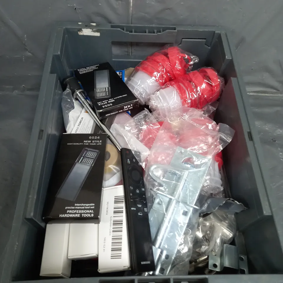 APPROXIMATELY 10 ASSORTED HOUSEHOLD ITEMS TO INCLUDE TV REMOTES , HARDWARE TOOLS , ETC 