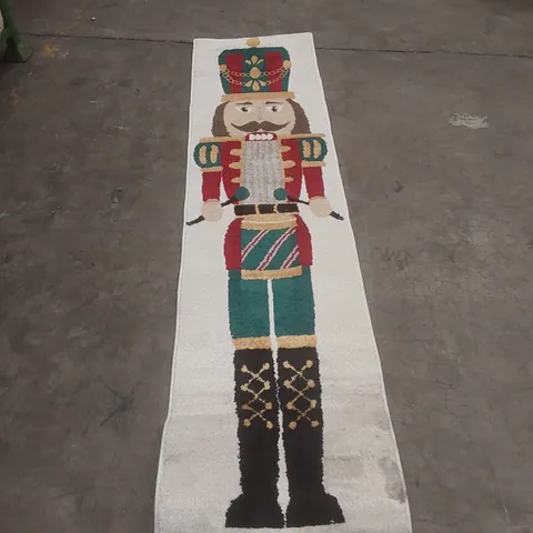 NUTCRACKER SOLDIER RUNNER RUG – WHITE WITH COLOURFUL NUTCRACKER MOTIF - APPROXIMATELY 230 X 58CM