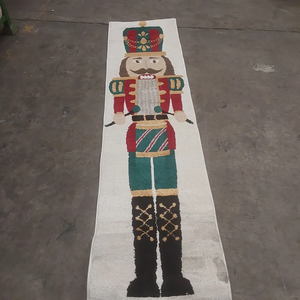 NUTCRACKER SOLDIER RUNNER RUG – WHITE WITH COLOURFUL NUTCRACKER MOTIF - APPROXIMATELY 230 X 58CM