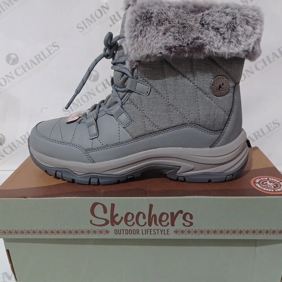 boxed skechers womens anti slip and waterproof fur lined boots - size 3.5