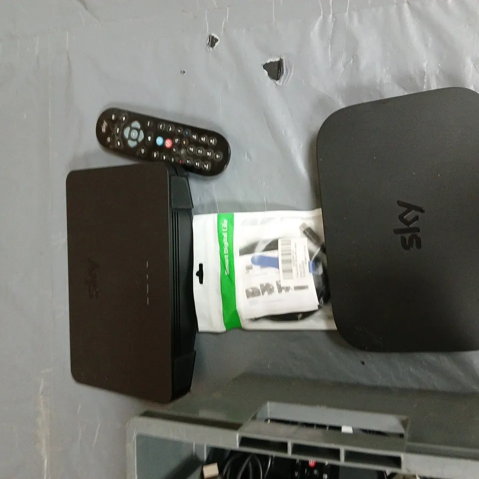 ASSORTED BOX OF CABLES AND WIFI ROUTERS ECT.APPROXIMATLEY 10 ITEMS