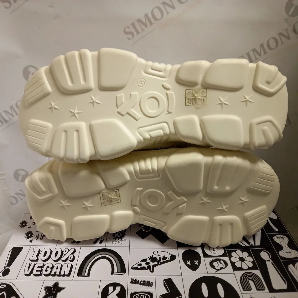 KOI VEGAN JINX WHITE MYSTIC CHARM TRAINERS - SIZE 8