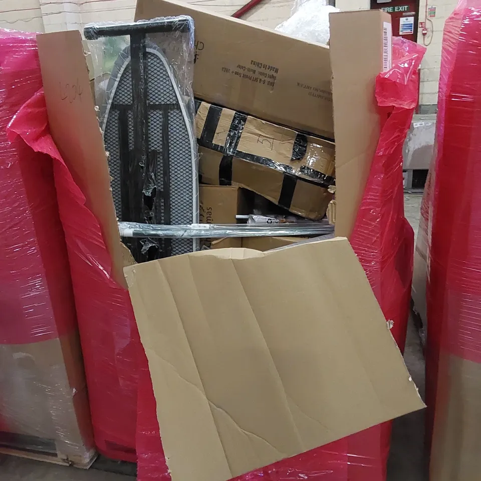 PALLET OF ASSORTED HOUSEHOLD ITEMS AND CONSUMER PRODUCTS. INCLUDES CAT SCRATCHER, IRONING BOARD, CHRISTMAS TREES ETC 