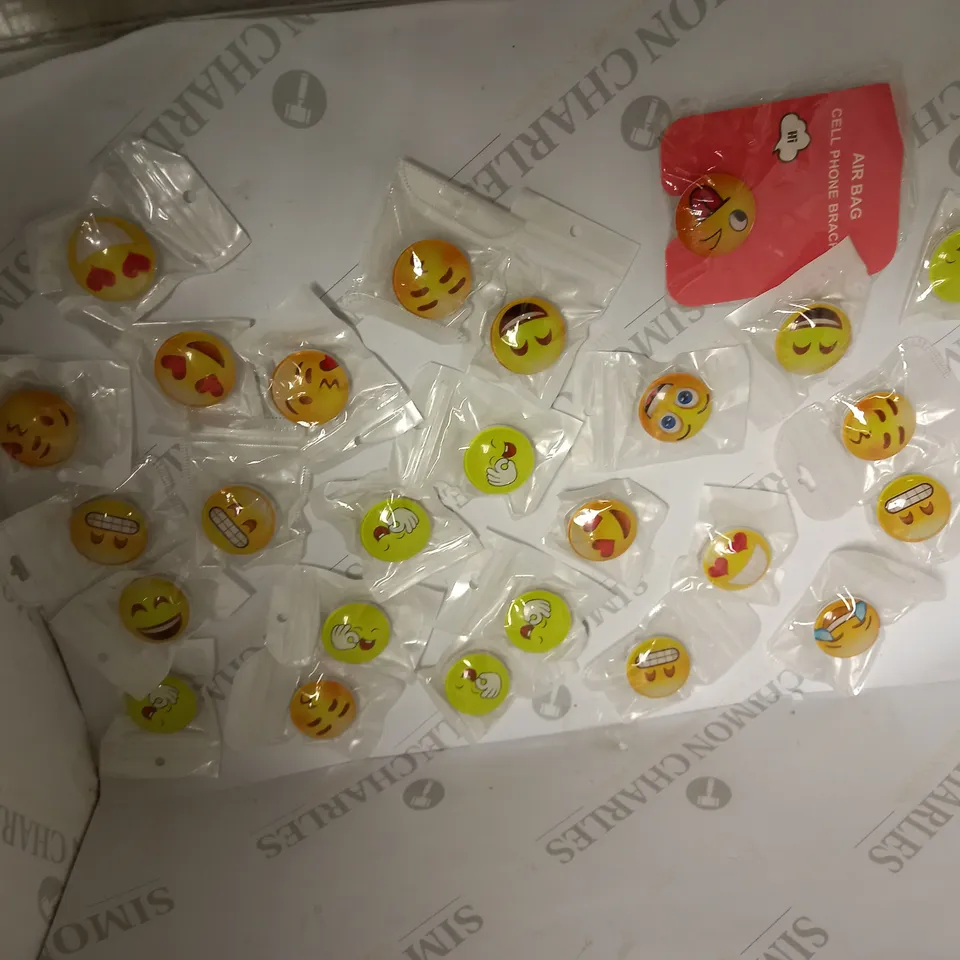 LOT OF APPROX 25 EMOJI POP SOCKETS