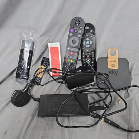 APPROXIMATELY 12 ASSORTED HOUSEHOLD ITEMS TO INCLUDE REMOTES, CABLES, ETC