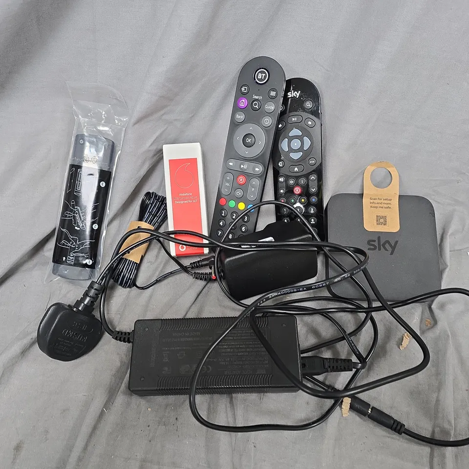 APPROXIMATELY 12 ASSORTED HOUSEHOLD ITEMS TO INCLUDE REMOTES, CABLES, ETC