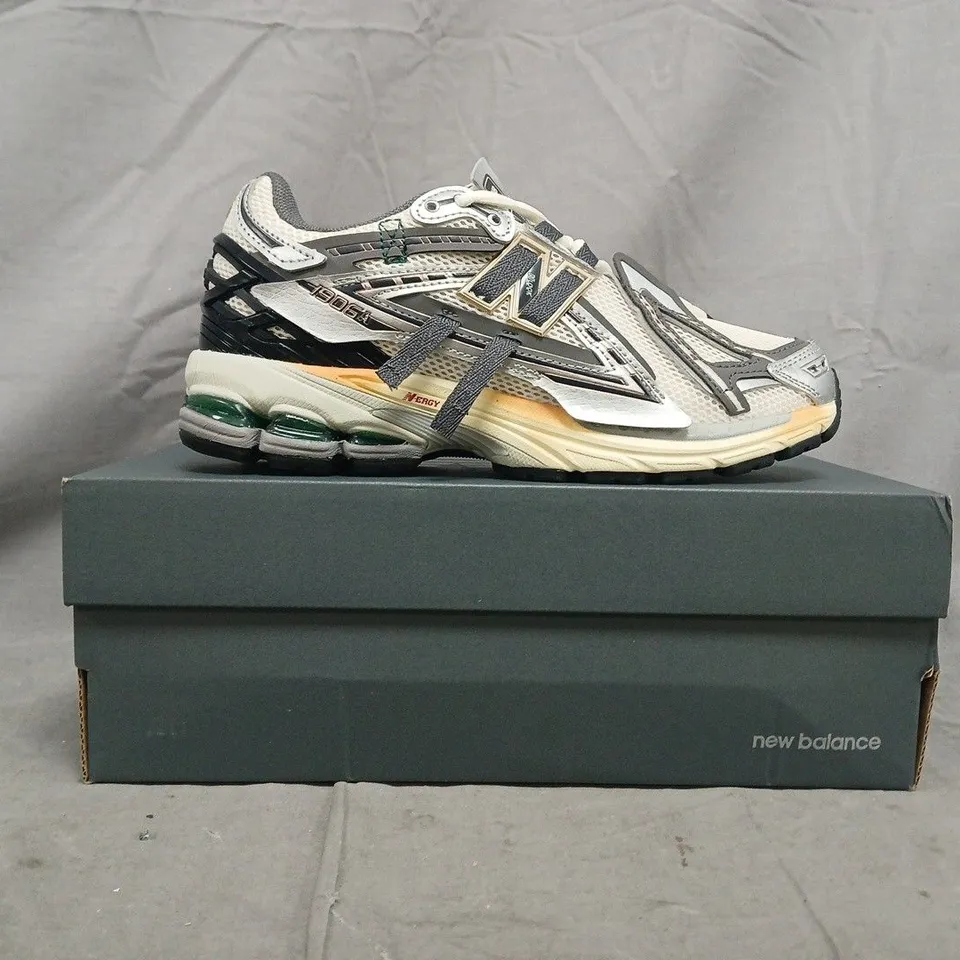 BOXED PAIR OF NEW BALANCE 1906A TRAINERS IN OFF WHITE/SILVER/BLACK SIZE UK 6