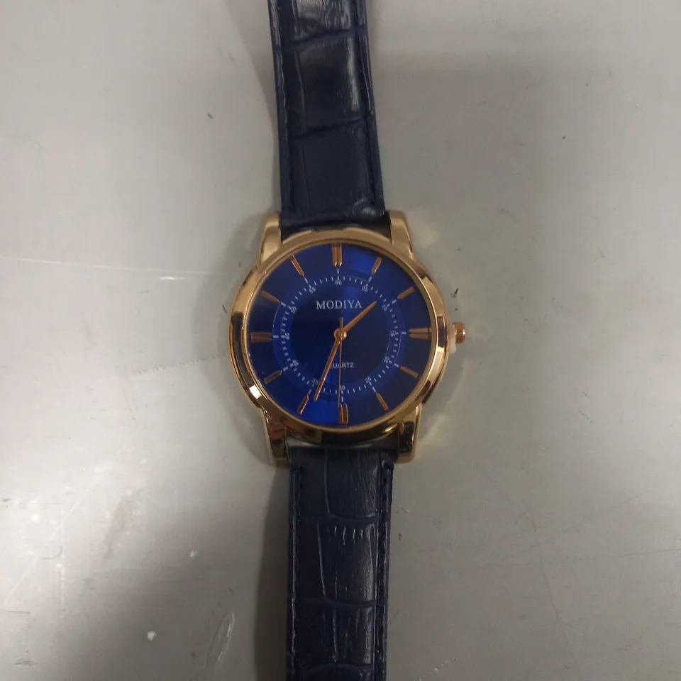 FOUR ASSORTED WATCHES IN VARIOUS STYLES TO INCLUDE MODIYA, AND YAZOLE