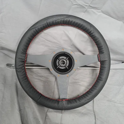 AFTERMARKET THREE-SPOKE STEERING WHEEL WITH GREY HUB – BLACK PERFORATED COVER, RED STITCHING   13.5 INC