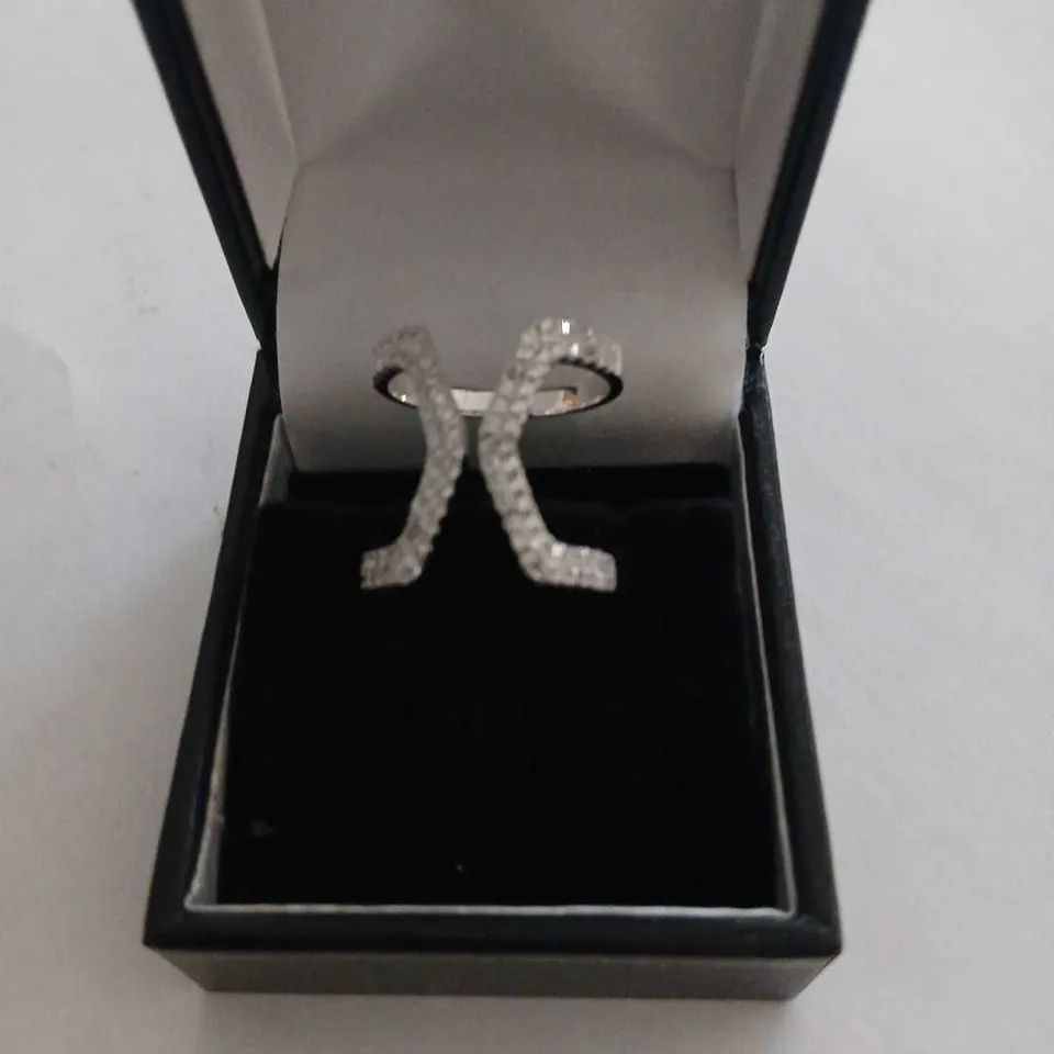 TEN ASSORTED STERLING SILVER RINGS