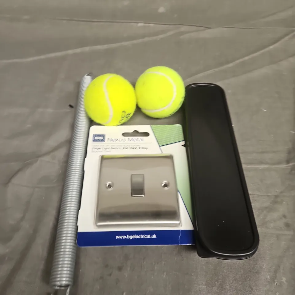 TOTE OF APPROXIMATELY 10 ASSORTED HOUSEHOLD ITEMS TO INCLUDE TENNIS BALLS, LIGHT SWITCHES AND SPRINGS