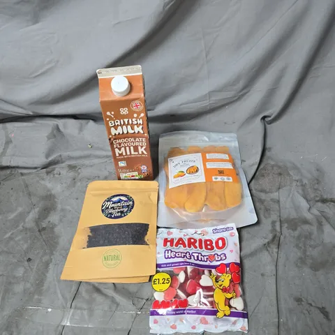 TOTE OF APPROXIMATELY 20 ASSORTED FOOD AND DRINK ITEMS TO INCLUDE DRIED MANGO, HARIBO, WILD BLUEBERRY TEA, CHOCOLATE MILK ETC