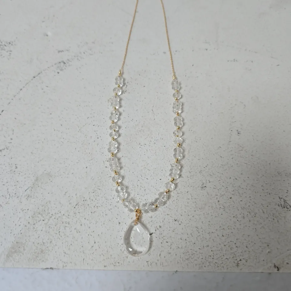 GOLD-TONE CRYSTAL BEAD NECKLACE WITH TEARDROP PENDANT
