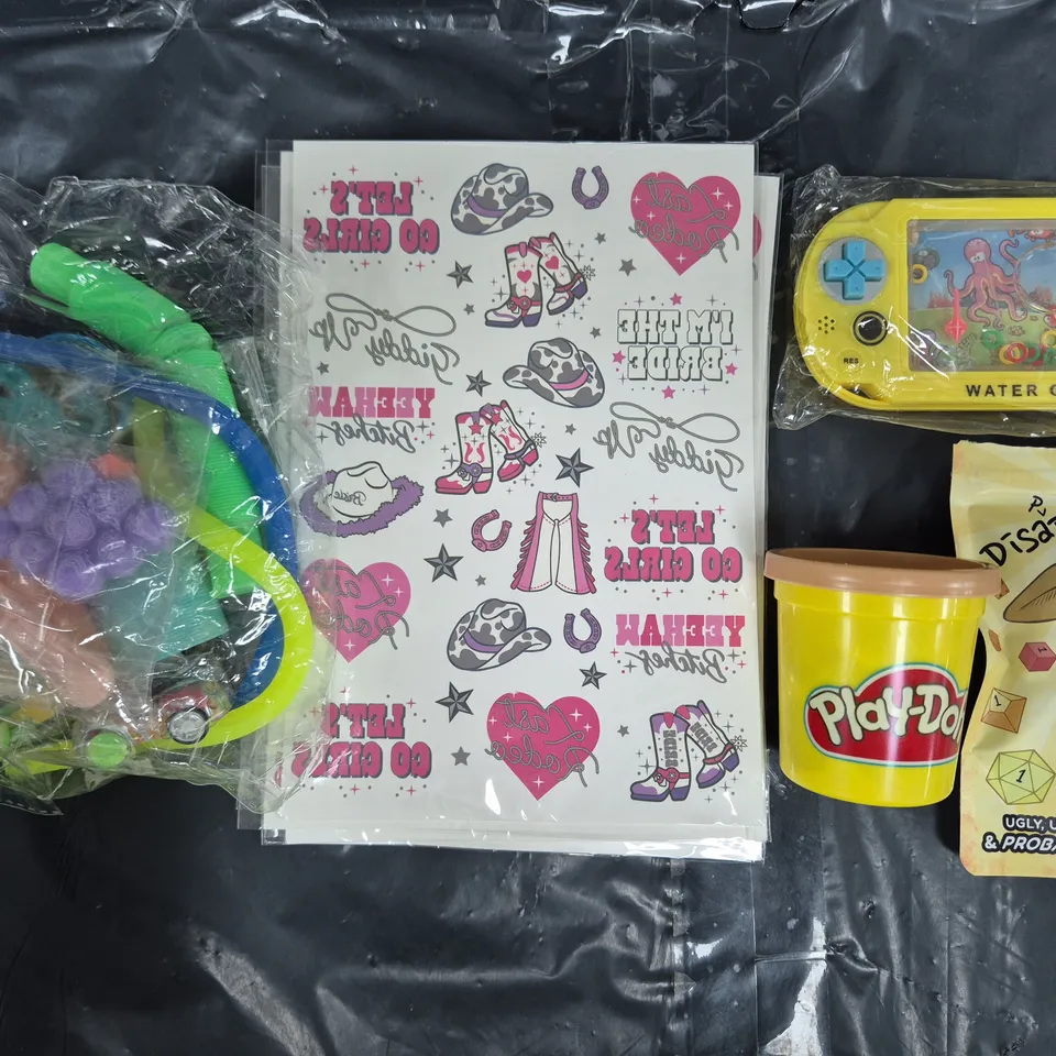 APPROXIMATELY 10 ASSORTED TOYS AND GAMES TO INCLUDE WATER GAME, DICE OF DISAPOINTMENT, ETC