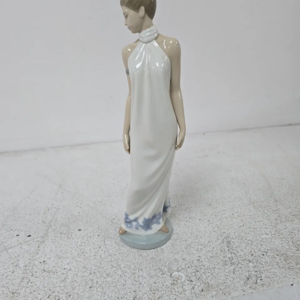 NAO PORCELAIN FIGURINE – WOMAN IN WHITE HALTER-NECK GOWN, HANDMADE IN SPAIN BY LLADRÓ