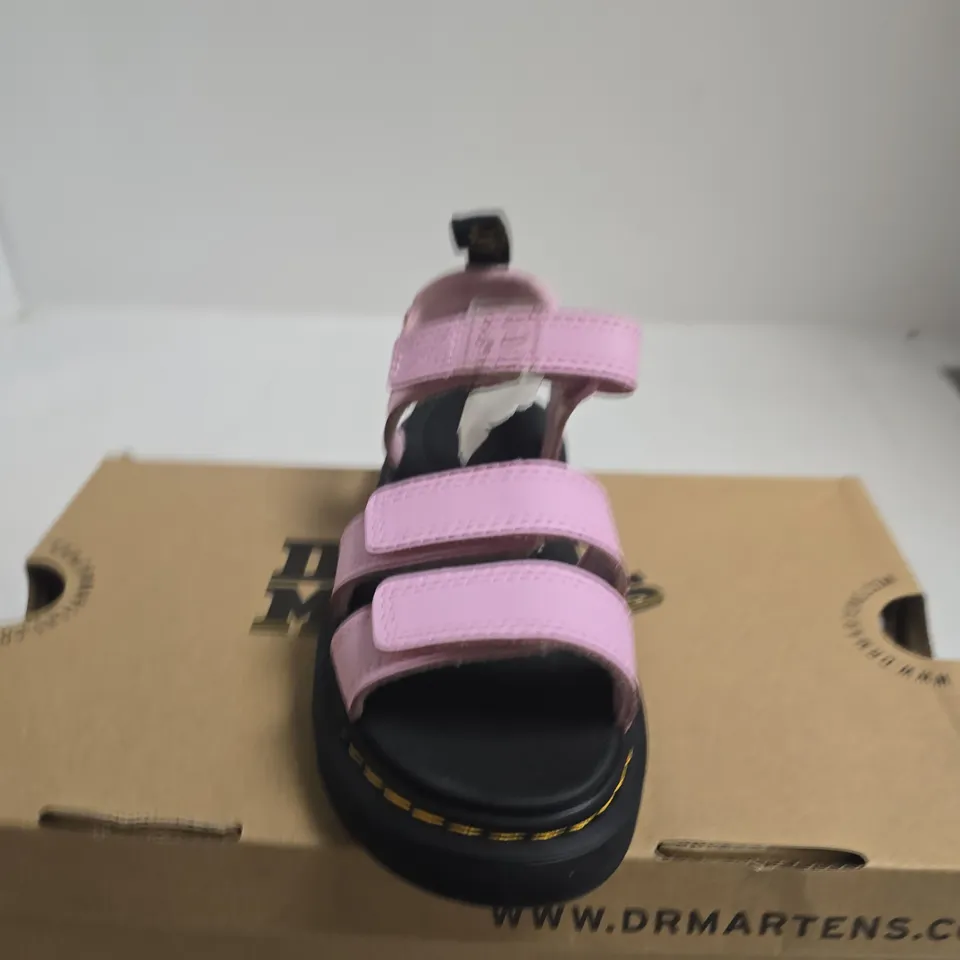 BOXED PAIR OF DR. MARTENS KLAIRE J ZEBRILUS KIDS SANDALS PALE PINK - UK 12