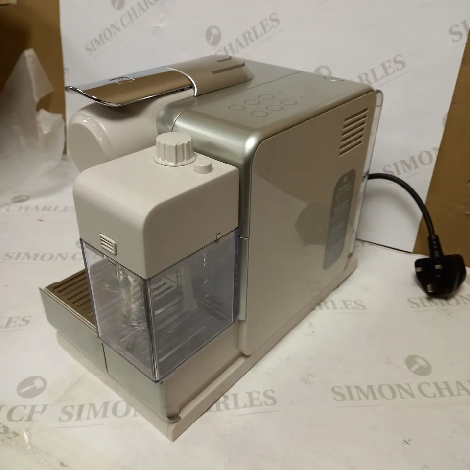 DELONGHI NESPRESSO MACHINE 