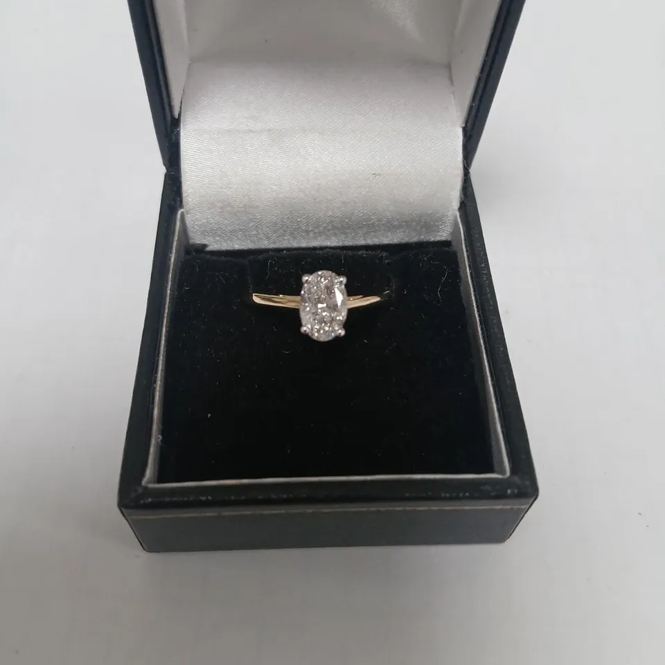 9CT GOLD SOLITAIRE RING SET WITH A LAB GROWN OVAL CUT DIAMOND WEIGHING +1.01CT