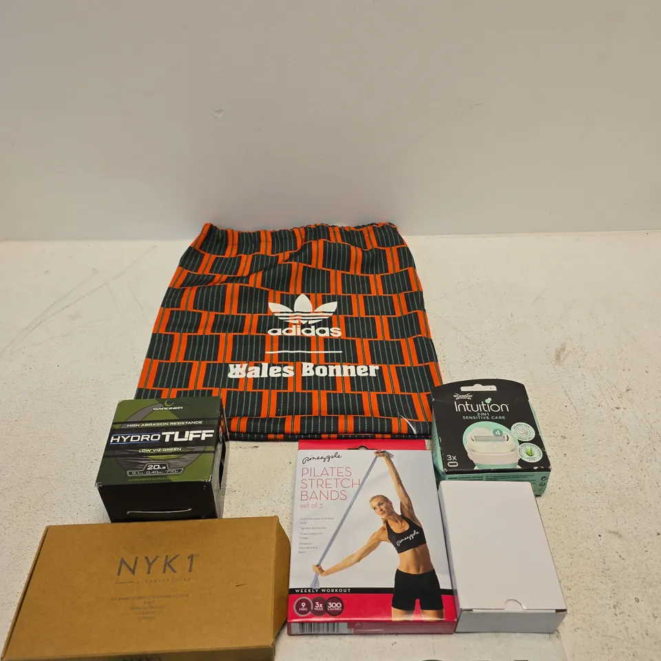 APPROXIMATELY 15 ASSORTED ITEMS INCLUDING WILKINSON INTUITION RAZOR BLADES, A POWER SUPPLY AND PINEAPPLE PILATES STRETCH BANDS