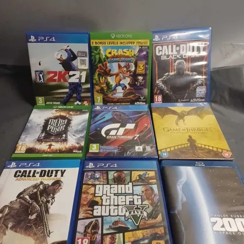 TOTE OF APPROXIMATELY 22 ASSORTED DVD'S & VIDEO GAMES TO INCLUDE -  PS4 2K21 , PS4 GTA 5 , PS4 CALL OF DUTY ADVANCED WARFARE ETC