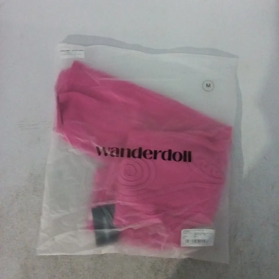 BAGGED WANDERDOLL ELIZA KNITTED MAXI SKIRT WITH SWIRL DETAIL IN PINK SIZE MEDIUM
