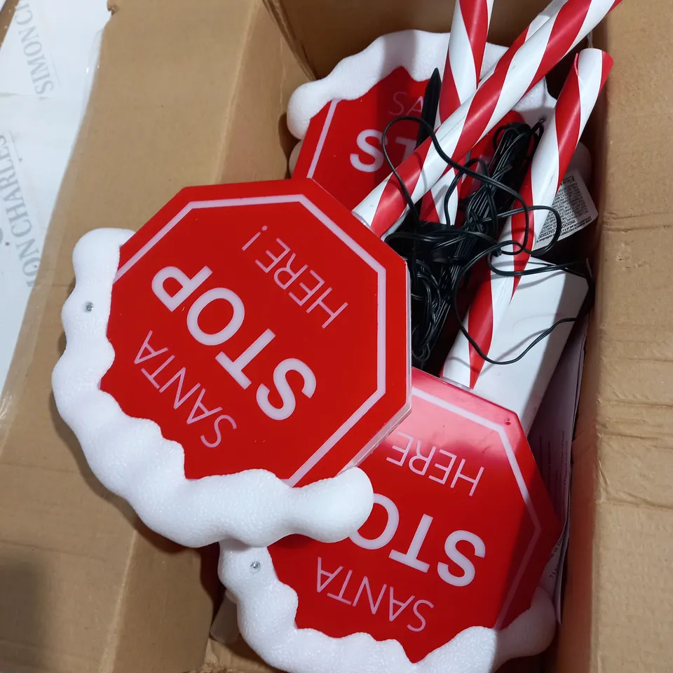 BOXED FESTIVE SET OF PRELIT SANTA STOP HERE STAKES