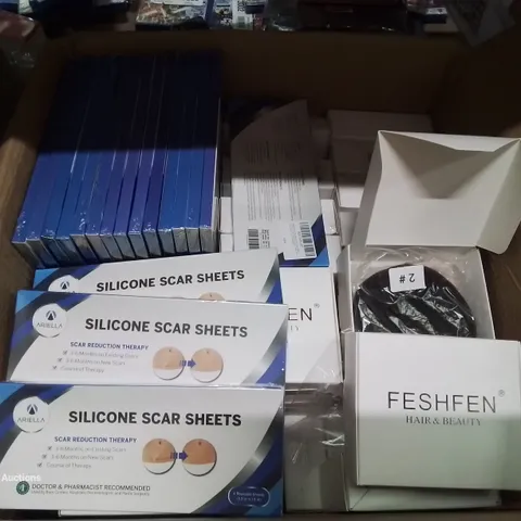 BOX CONTAINING LARGE AMOUNT OF SILICONE SCAR SHEETS AND HAIR BUN EXTENSIONS