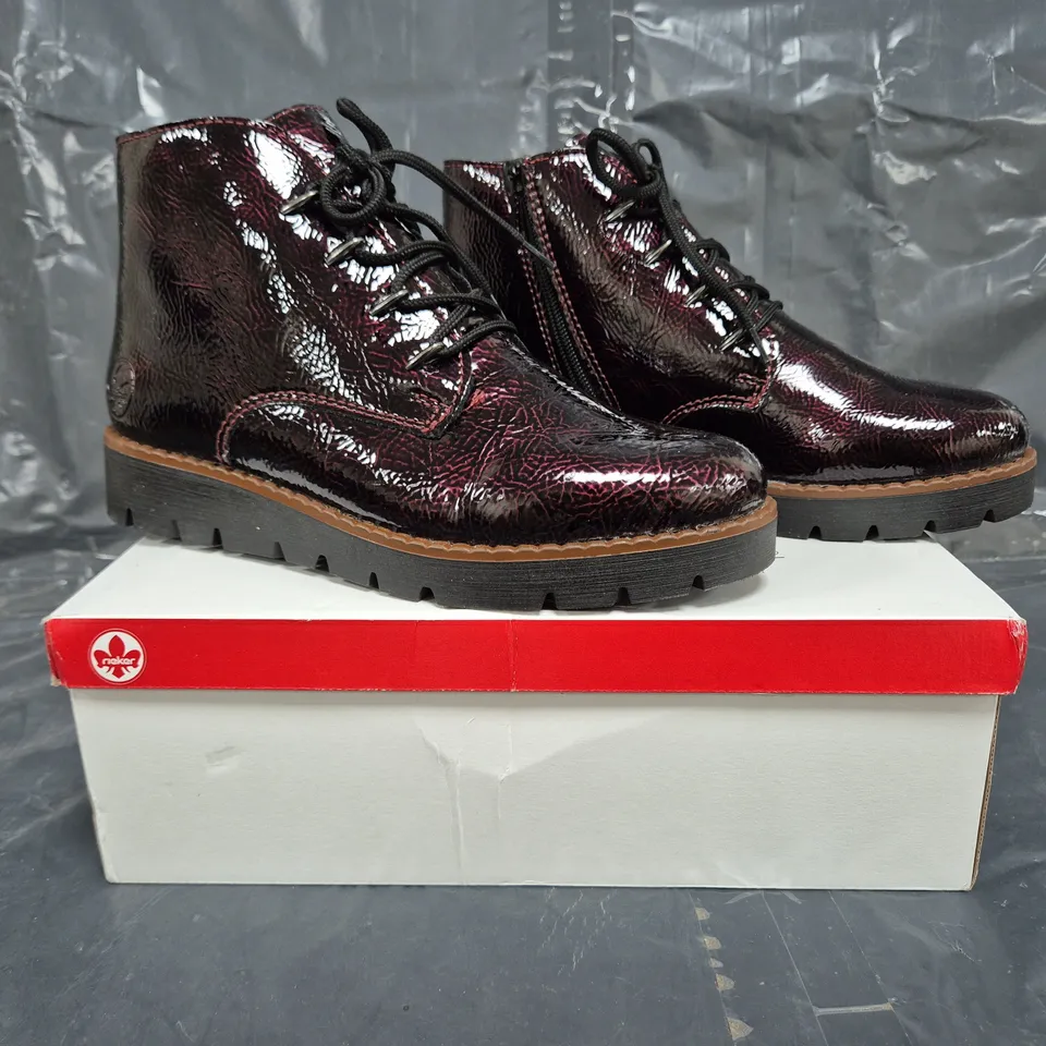 BOXED PAIR OF RIEKER LOW WEDGE BOOTS IN BORDEAUX SIZE 5