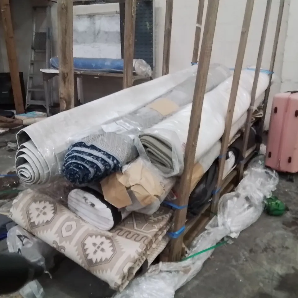 STILLAGE OF APPROXIMATELY 15 QUALITY DESIGNER RUGS XL