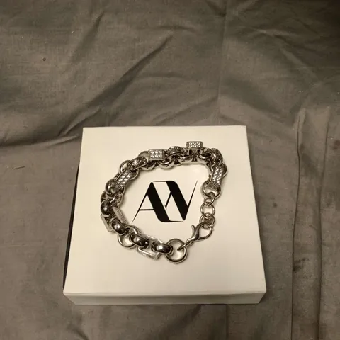 SILVER-TONE BRACELET WITH CRYSTAL-EMBELLISHED LINKS