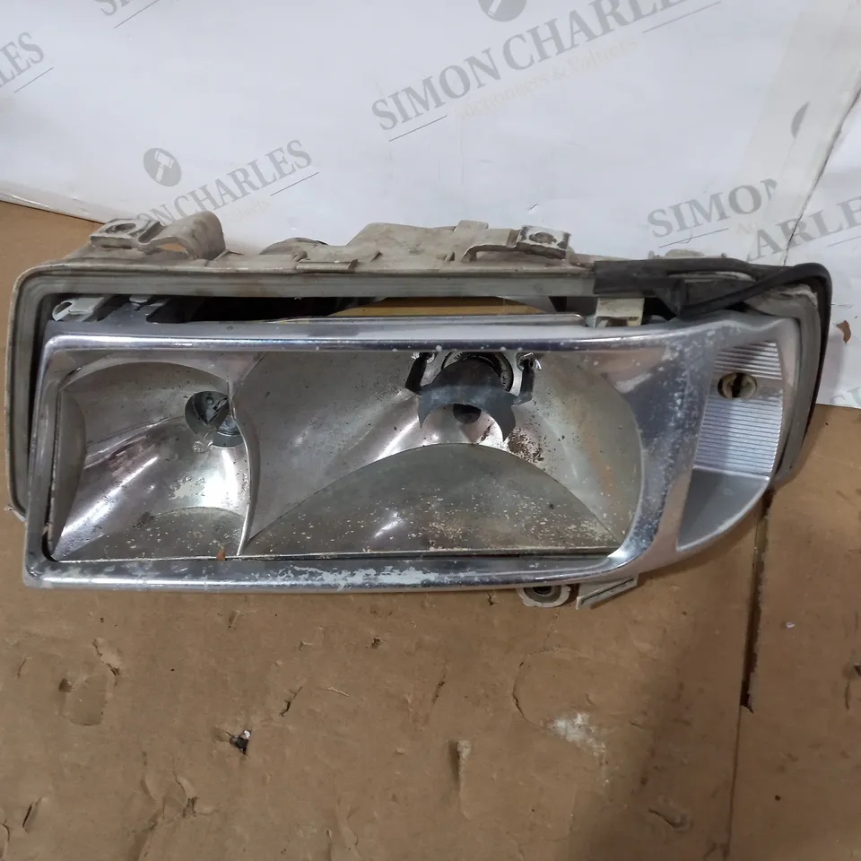 HELLA FRONT LEFT HEADLIGHT