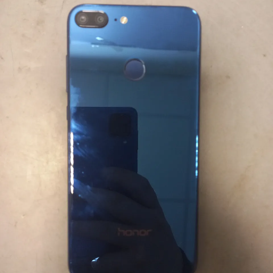 HONOR LLD-L31 MOBILE PHONE IN BLUE