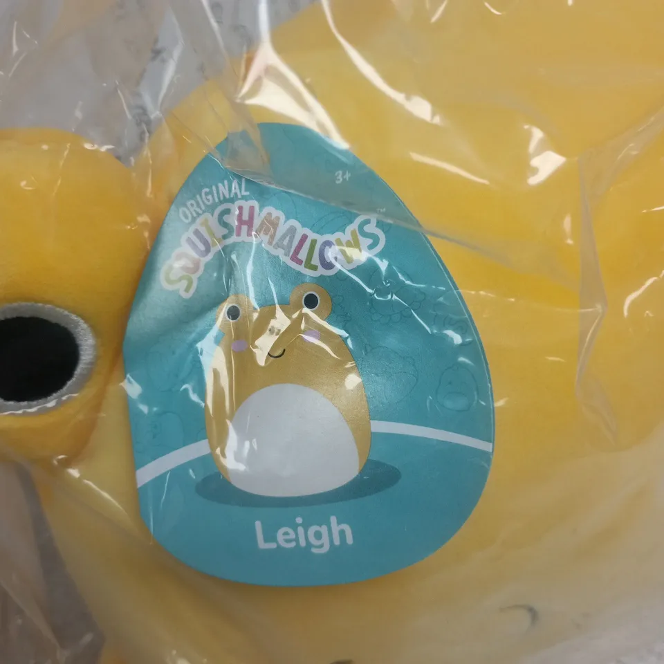 SQUISHMALLOWS LEIGH PLUSH TOY – YELLOW, IN CLEAR PLASTIC PACKAGING