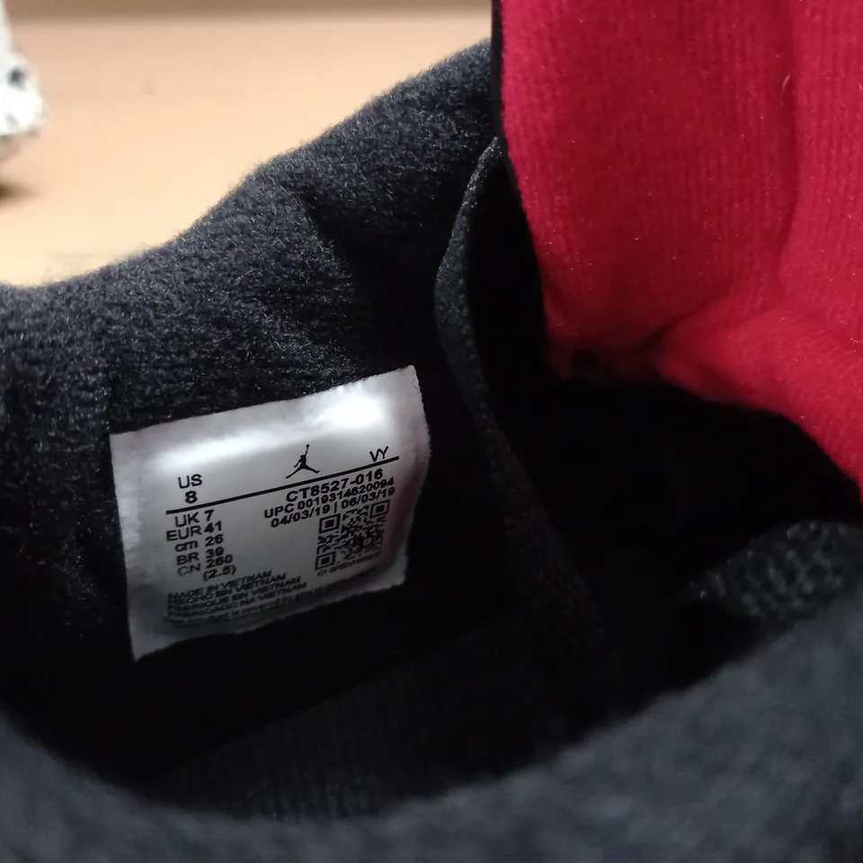 PAIR OF AIT JORDAN 4 RETRO TRAINERS IN BLACK/RED - UK 7