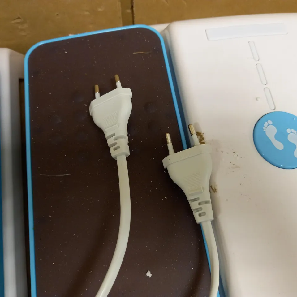 PAIR OF HOMEDICS LEG EXERCISERS