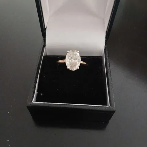 18CT GOLD SOLITAIRE RING SET WITH A NATURAL OVAL CUT DIAMOND WEIGHING +2.66CT