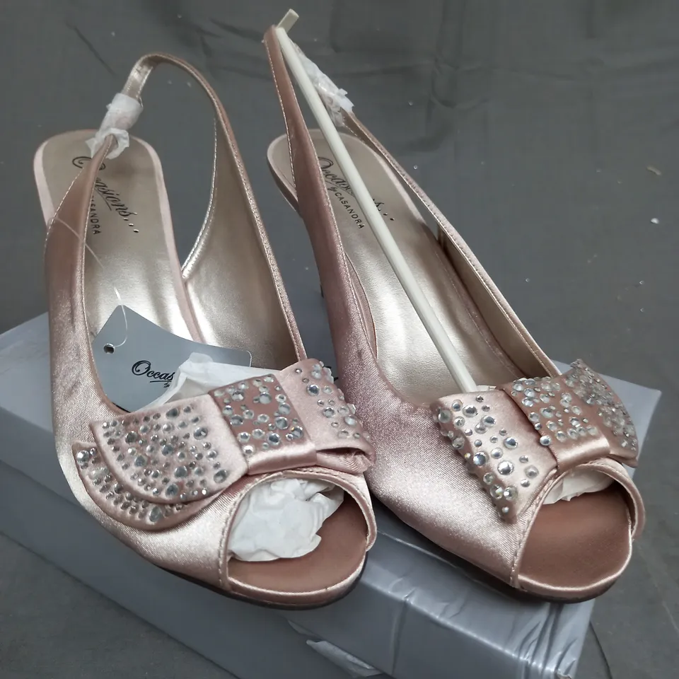 BOX OF 10 PAIRS OF CHAMPAGNE HIGH HEELED SHOES 