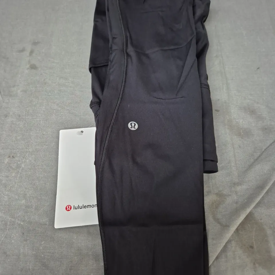 LULULEMON FAST AND FREE HR TIGHT 25" POCKETS - SIZE 6 