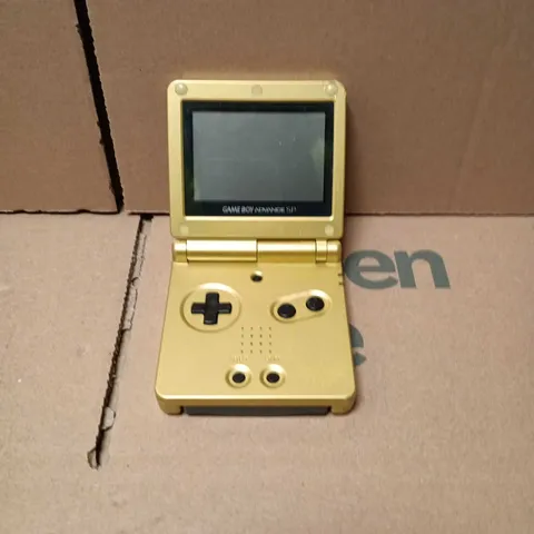 NINTENDO GAME BOY ADVANCE SP (GOLD) HANDHELD CONSOLE WITH MARIO VS DONKEY KONG CARTRIDGE