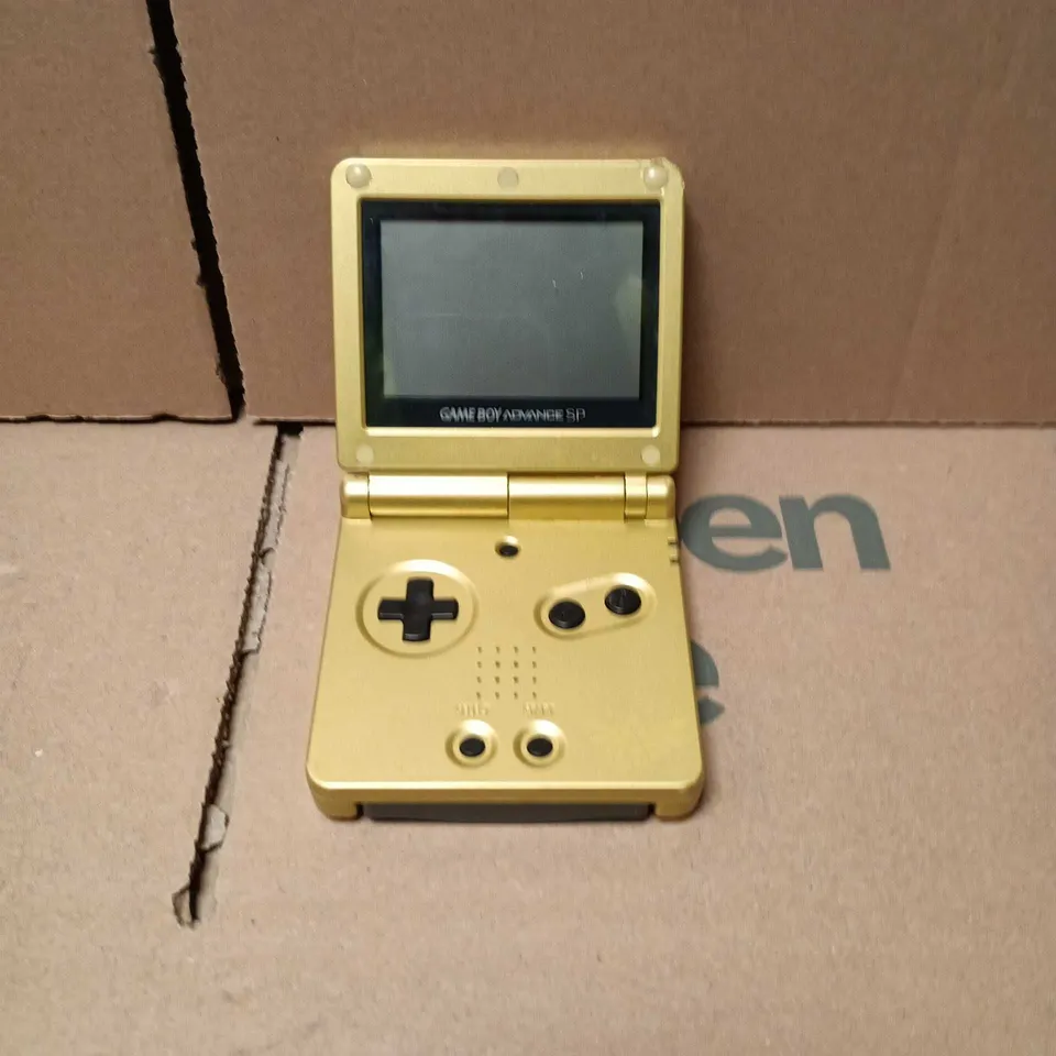 NINTENDO GAME BOY ADVANCE SP (GOLD) HANDHELD CONSOLE WITH MARIO VS DONKEY KONG CARTRIDGE