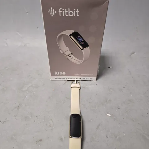 BOXED FITBIT LUXE FITNESS TRACKER