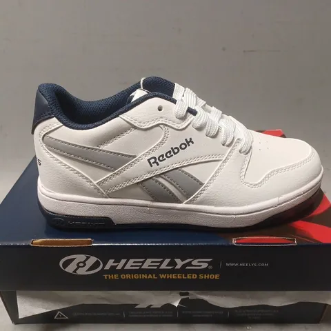 BOXED PAIR OF REEBOK HEELYS - UK SIZE 2