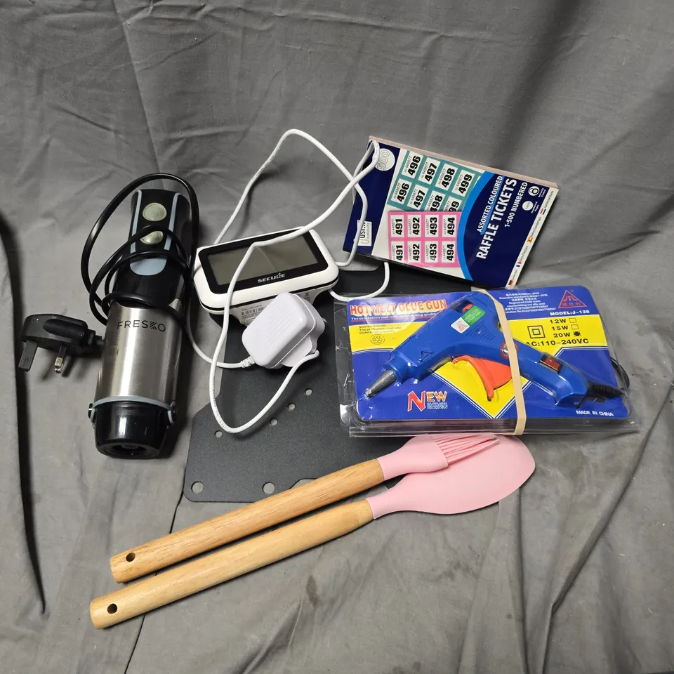 APPROXIMATELY 12 ASSORTED HOUSEHOLD ITEMS TO INCLUDE HOT MELT GLUE GUN, RAFFLE TICKETS, HAND BLENDER, ETC