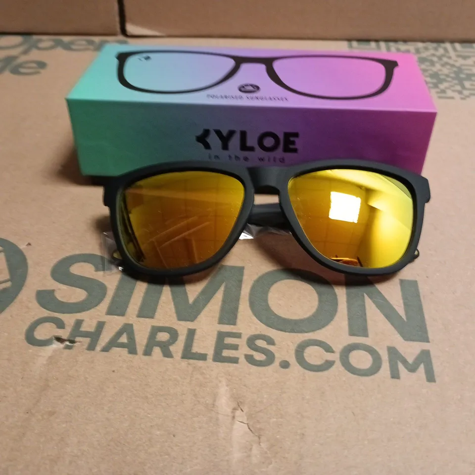 KYLOE IN THE WILD  POLARISED SUNGLASSES – BLACK FRAME WITH YELLOW MIRRORED LENSES